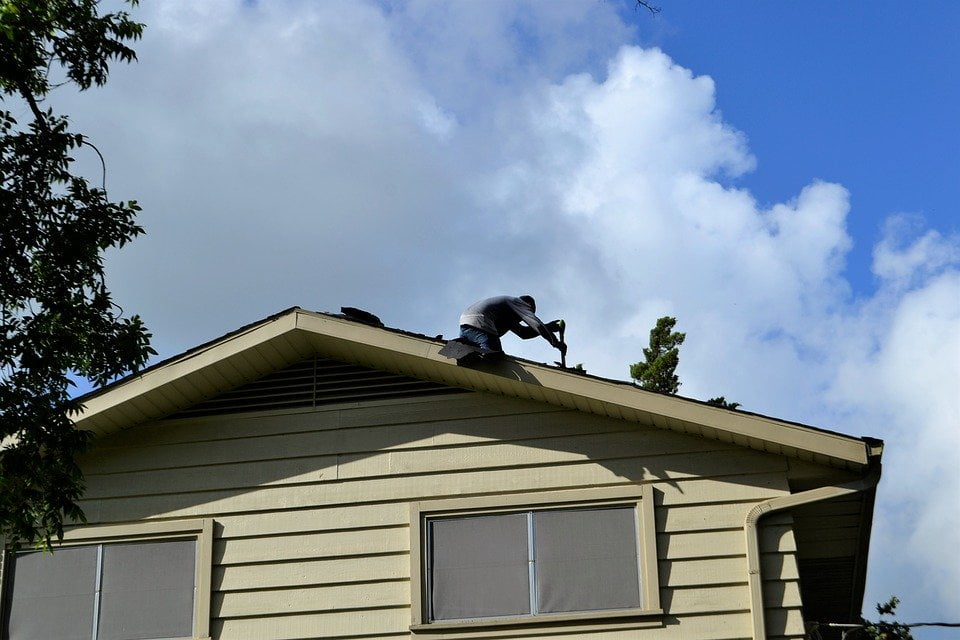 a house with a fire on the roof