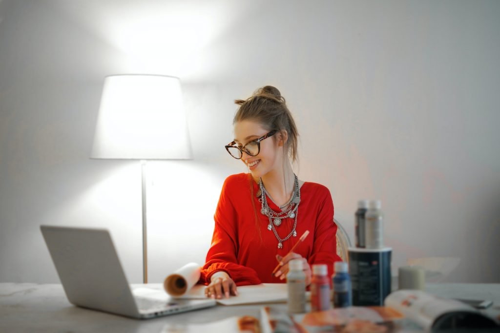 a woman sitting at a desk