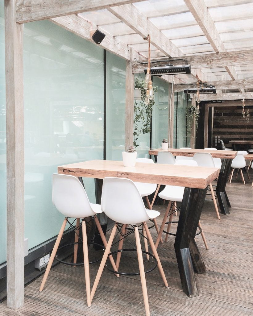 a room with tables and chairs