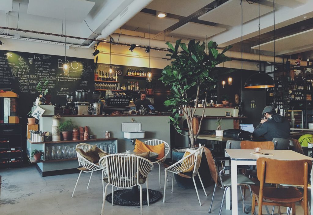 a restaurant with tables and chairs