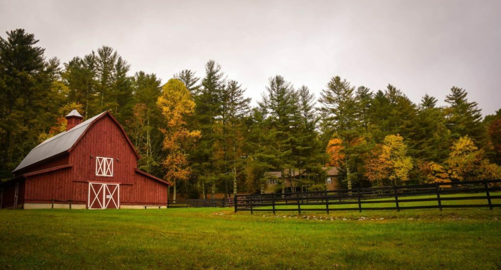 a barn in a field