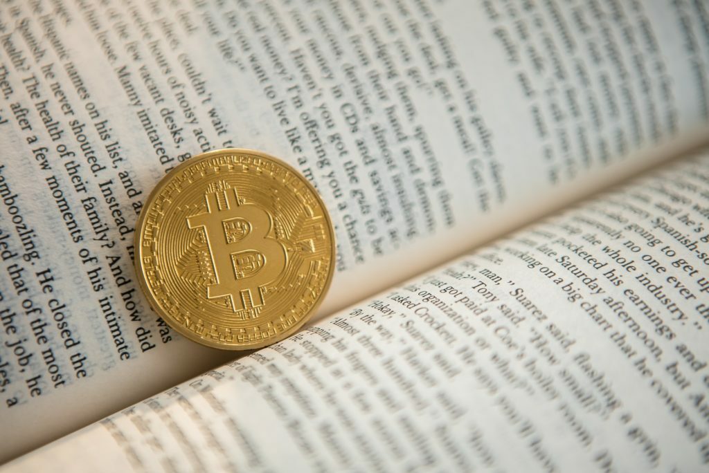 a coin on a book