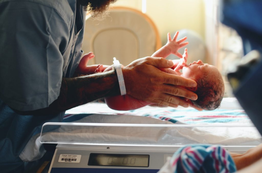 a person holding a baby