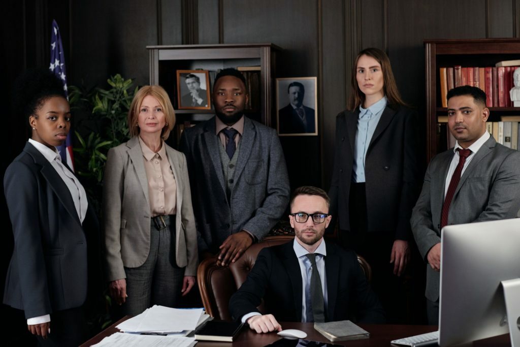 a group of people standing in a room