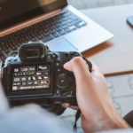 a person holding a camera
