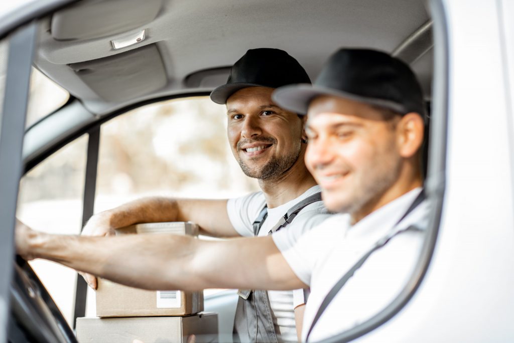 a couple of men in a car