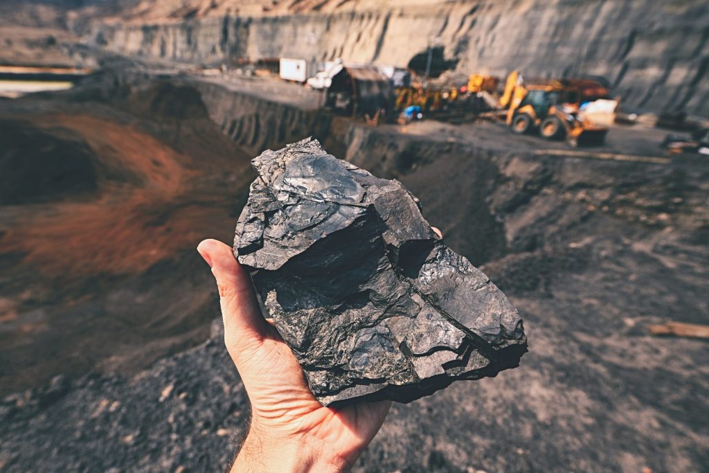 a hand holding a rock