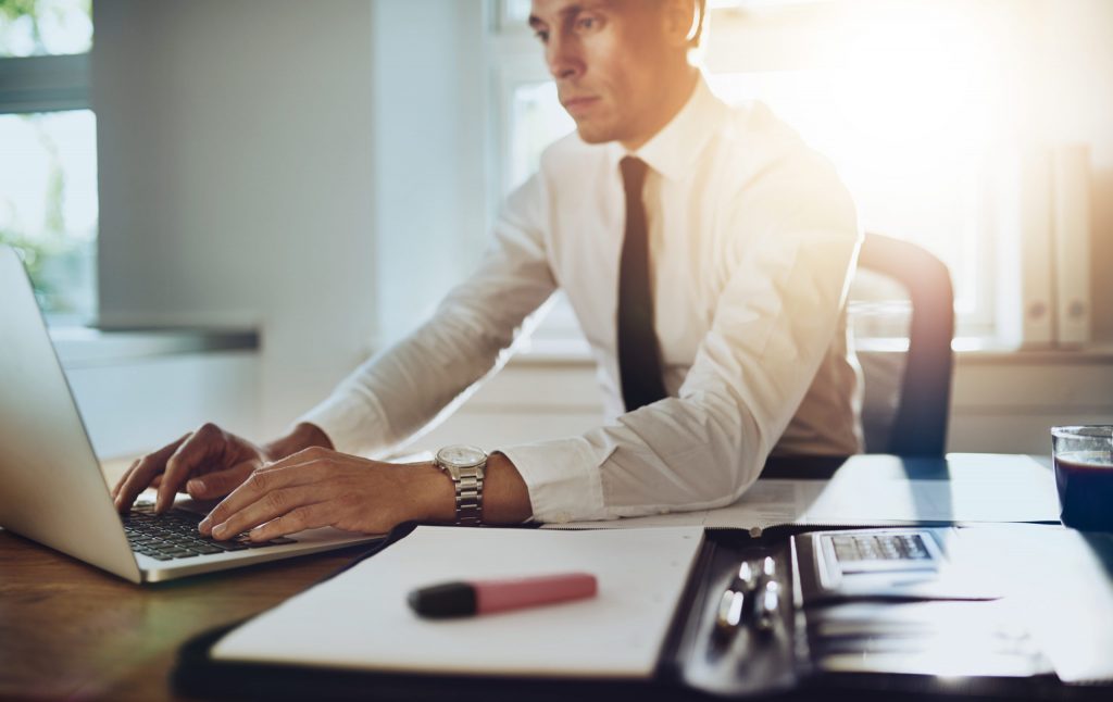 Business man working on a laptop