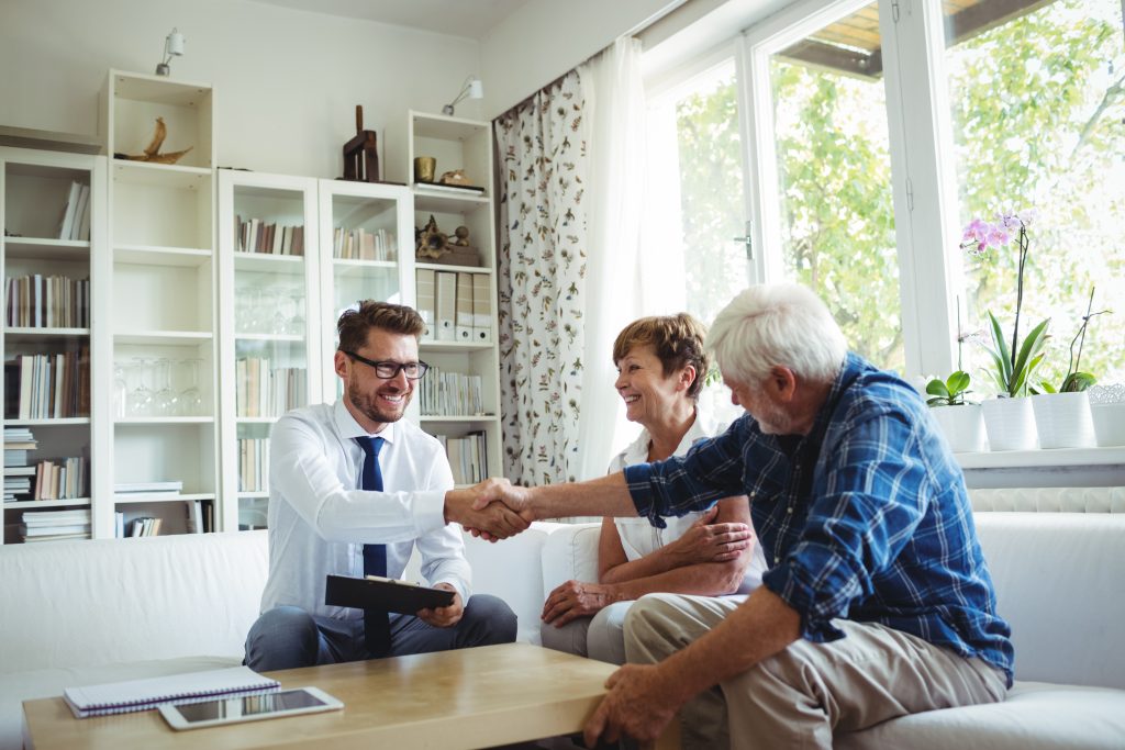 a group of people sitting in a room