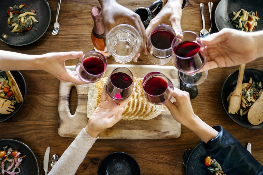 Friends making a toast at a dinner party