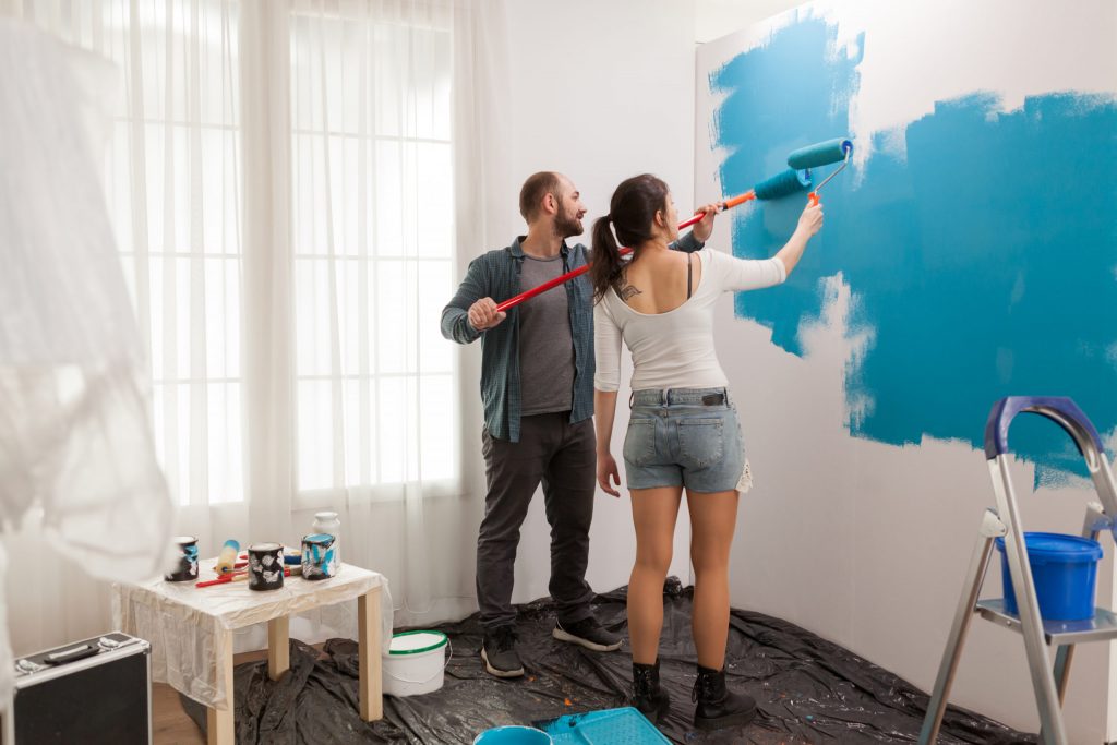 couple in home decoration       utc scaled