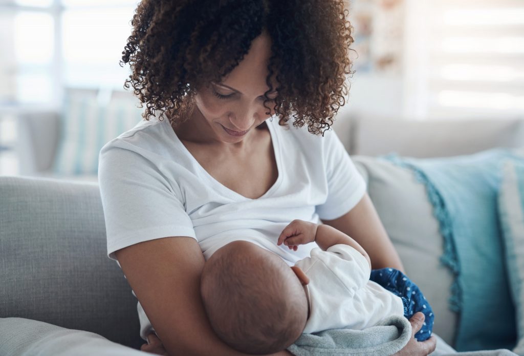 shot of a young woman breastfeeding her adorable b       utc scaled