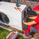 technician repairing heat pump unit       utc scaled