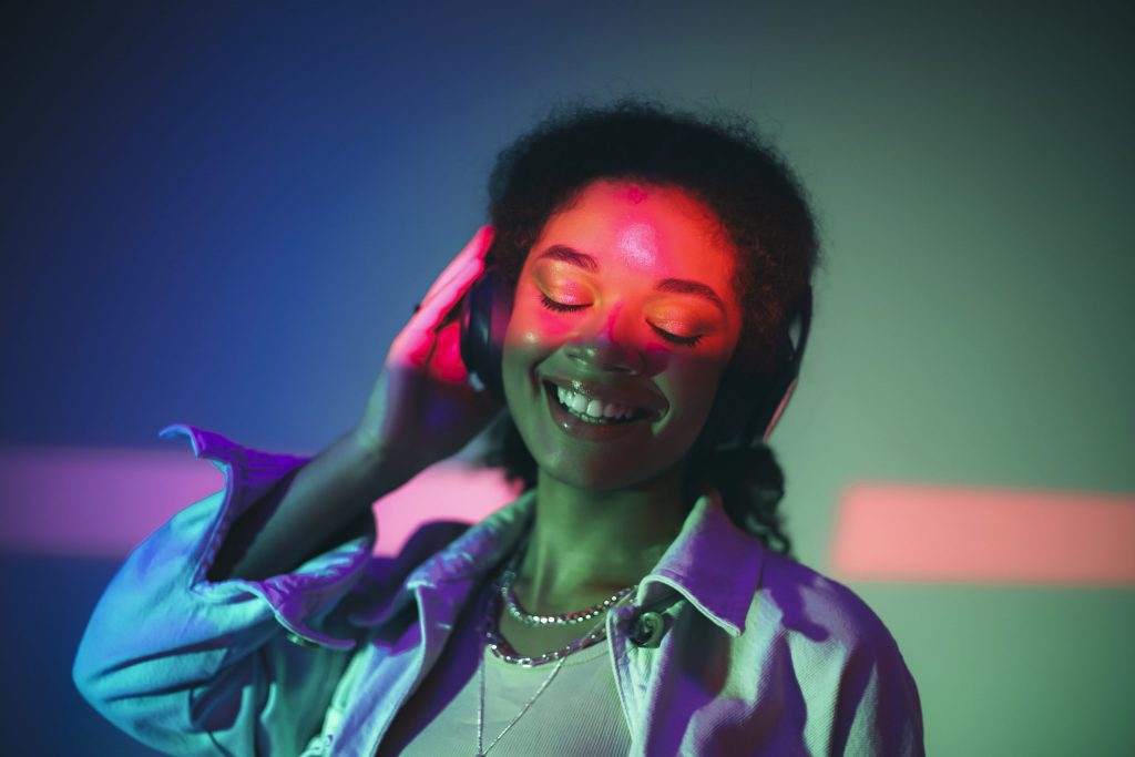 young happy african american woman in headphones l       utc scaled