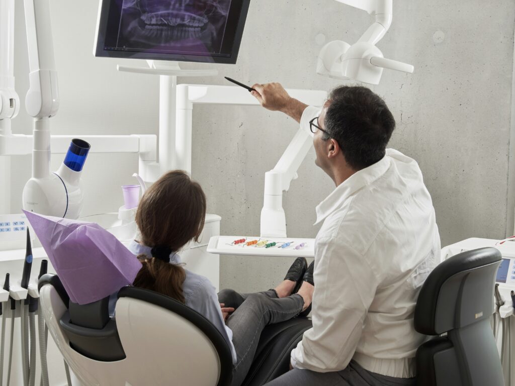 a man and a woman in a room with a television and a table