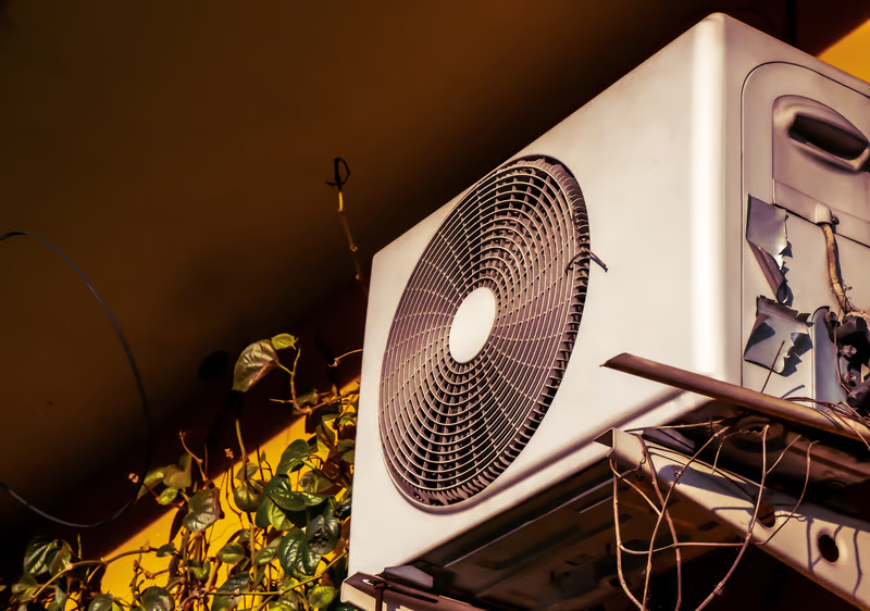 Professional heat pump repair might be your next step to summer comfort in Dallas, TX, if your AC unit looks like this one. Call for service!